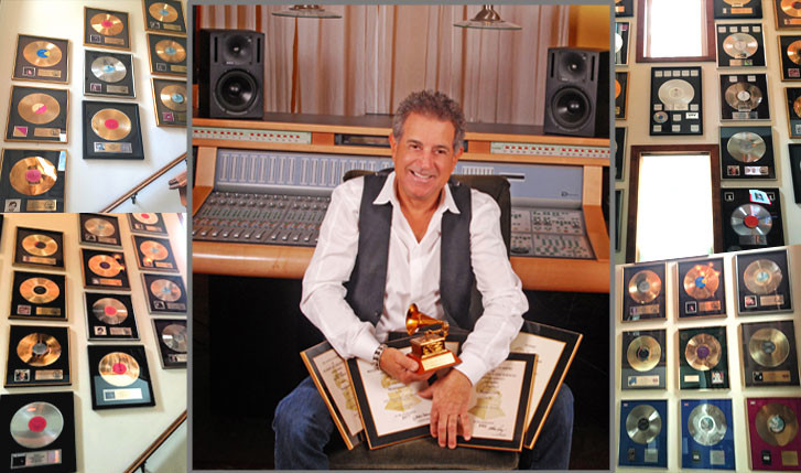 Val in the studio with Grammy awards